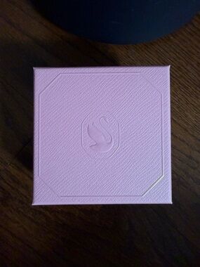Pink Embossed Jewelry Box with Swan Logo
